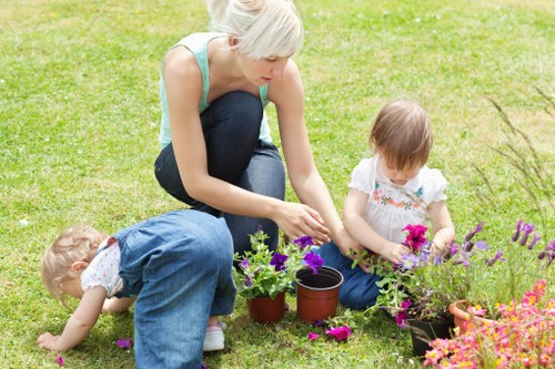 Local gardener maintaining a well-kept garden in Lower Morden