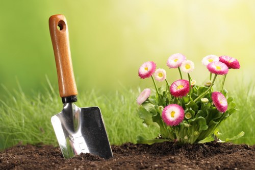 Gardeners Lower Morden shaping hedges and restoring garden order